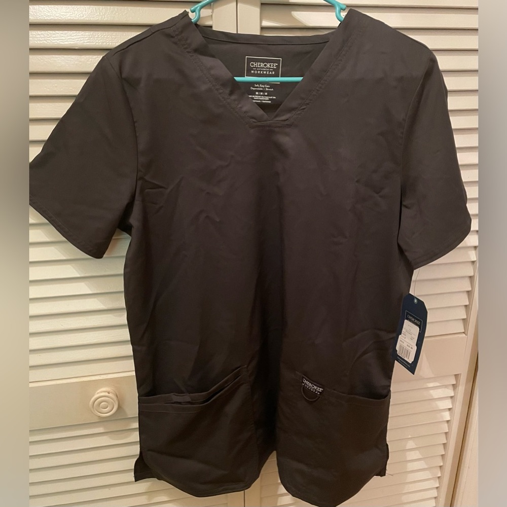 NWT. Ladies dark gray Cherokee Workwear scrub shirt. Size M.